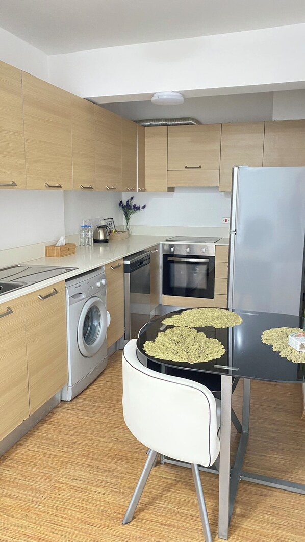 Private kitchen - One-bedroom seafront apartment on Mackenzie with stunning sea views. (Larnaca)