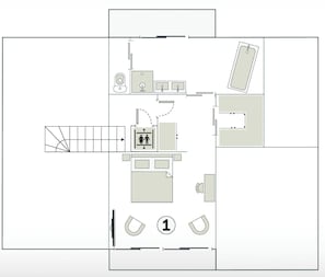 A floor plan with a bathroom, a kitchenette, a seating area, and a small office.