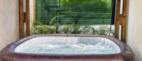 Bungalow, Balcony | Outdoor spa tub
