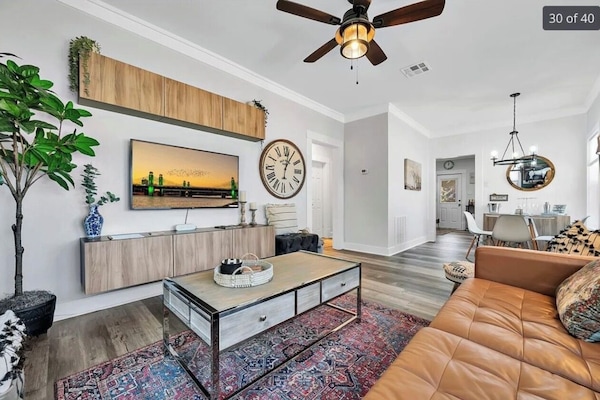Large flatscreen tv, tv table, coffee table with storage