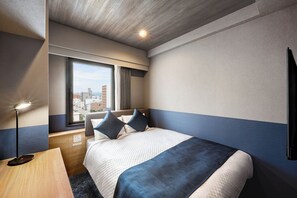 Quarto solteiro, para não fumantes | Cofres nos quartos, escrivaninha