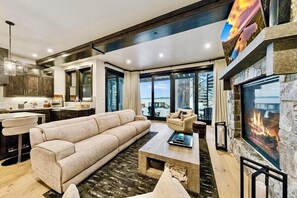 Smart TV, fireplace, books, stereo