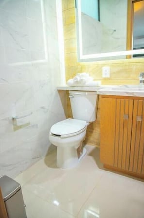 Hair dryer, towels, soap, toilet paper