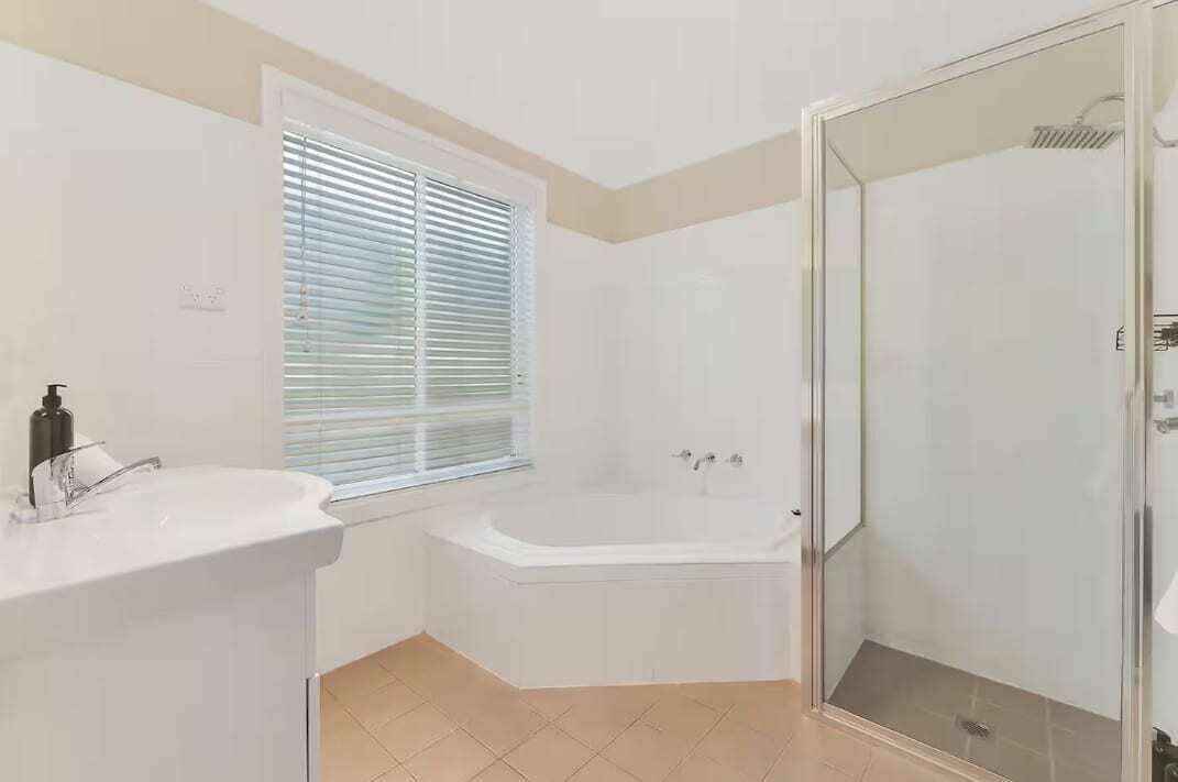 Shower, hair dryer, towels, shampoo