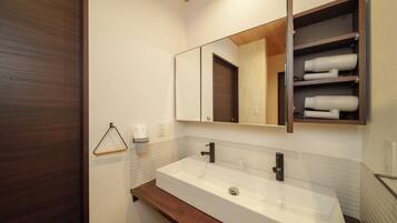 Comfort Condo, Non Smoking | Bathroom | Separate tub and shower, free toiletries, hair dryer, slippers