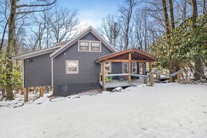 A two-story house with a covered porch and a small deck. - 3 BR Beech Mtn Basecamp: 2 Mi to Resort, Fireplace & Firepit (Beech Mountain)