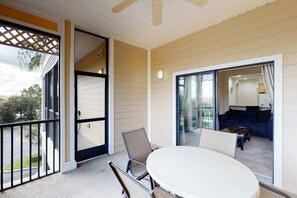 Outdoor dining - 3rd floor condo w/ pools, balcony, sauna, gym, hot tub, near theme parks (Kissimmee)