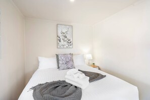Iron/ironing board, travel crib, WiFi, bed sheets