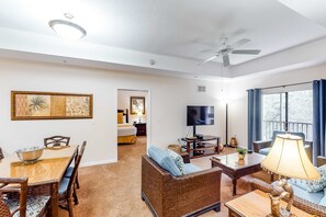 Living area - 3rd floor condo w/ gym, hot tub, sauna, balcony, shared pools, near theme parks (Kissimmee)