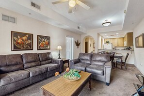 Living area - 3rd floor condo w/ balcony, gym, shared pools, sauna, hot tub, near theme parks (Kissimmee)