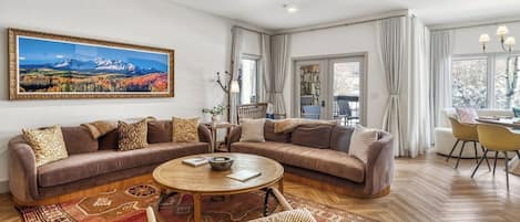 Apartment (2 Bedrooms) | Living area | TV, fireplace