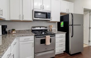 Fridge, microwave, oven, stovetop - Coastal Nook | 2BR/2BA | Relaxed Charlotte Living (Charlotte)