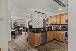 Fridge, microwave, oven, stovetop - Tranquil Condo In The Trees | Spacious 2Bd Hot Tub & Pool (Canmore)