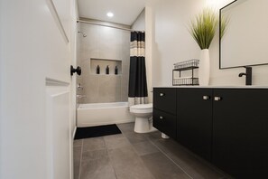 Hair dryer, towels, soap, toilet paper - Noir: Stylish 3BR w'TV's All Rooms +Workspace & Yard (Edinburg)