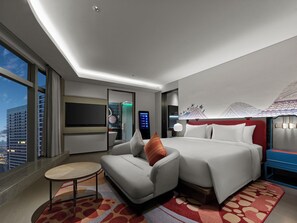A modern hotel room with a large bed, a sofa, a small table, and a TV. - Dhawa Xi'an Chanba (Xi'an)