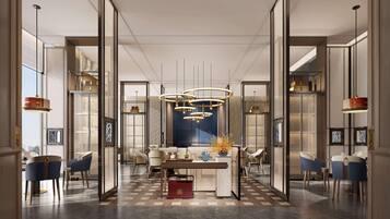 A modern interior with a central dining area, multiple seating options, and contemporary lighting fixtures.