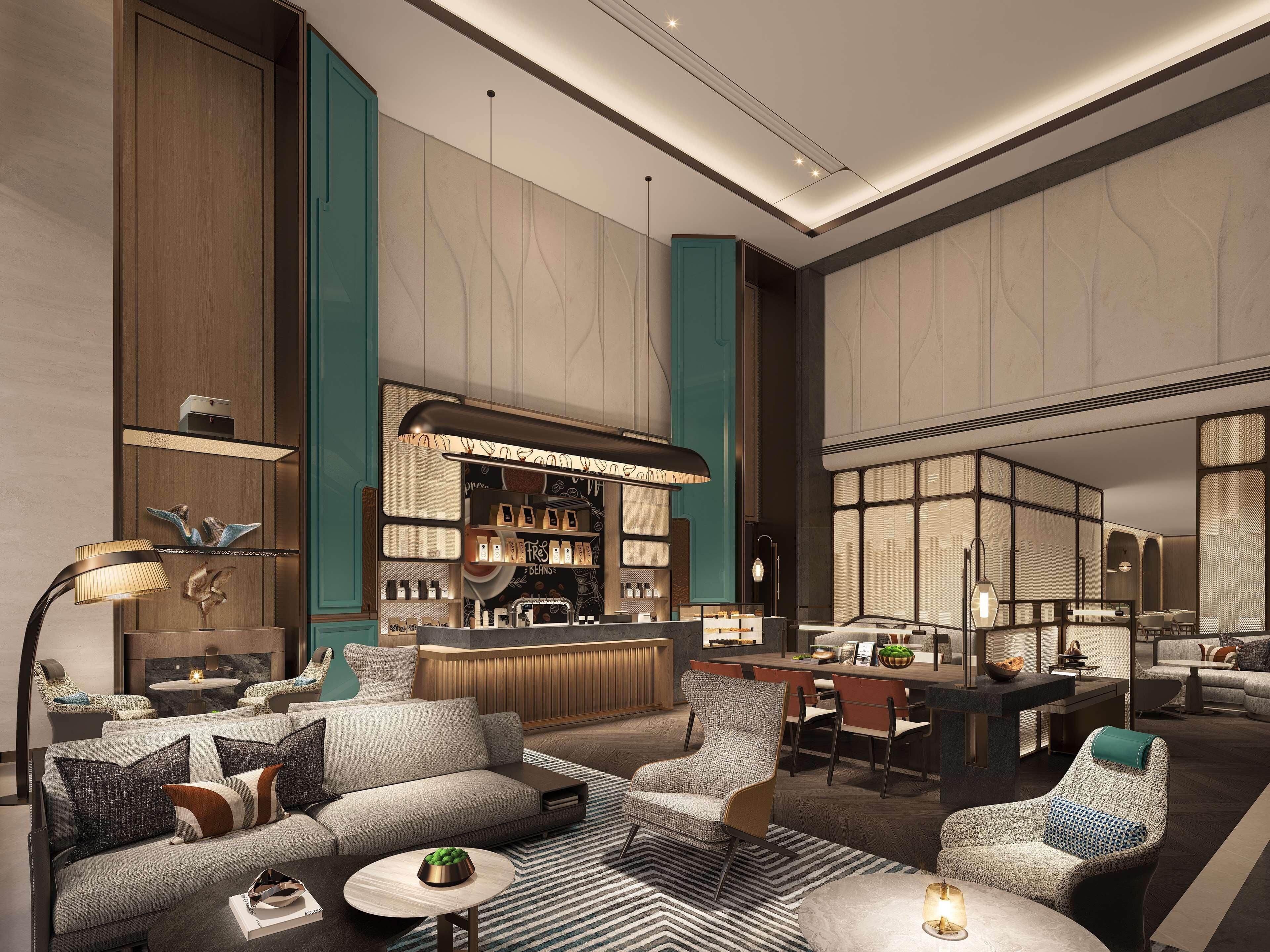 Eine moderne Hotelhalle mit Bar, Sitzgelegenheiten und einem Essbereich.
