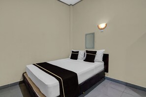 Standard Double Room | Premium bedding, desk, free WiFi, bed sheets - Hotel O near Mall Ciputra formerly Aloha Inn (Pekanbaru)