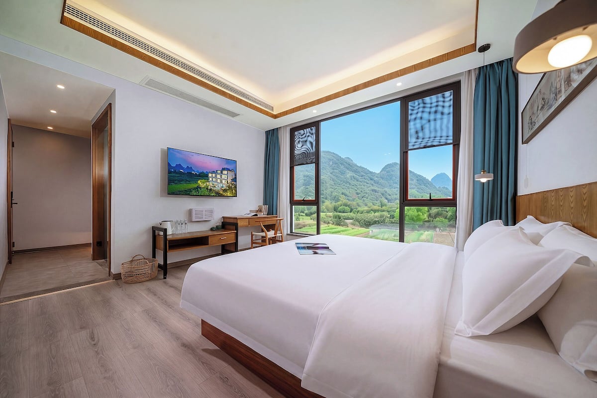 Suite superior, vista a la montaña | Espacio para trabajar con laptop, insonorización y wifi gratis