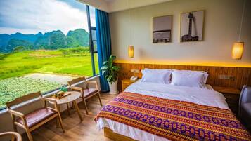 Luxury Suite, 1 King Bed, Mountain View | Laptop workspace, free WiFi