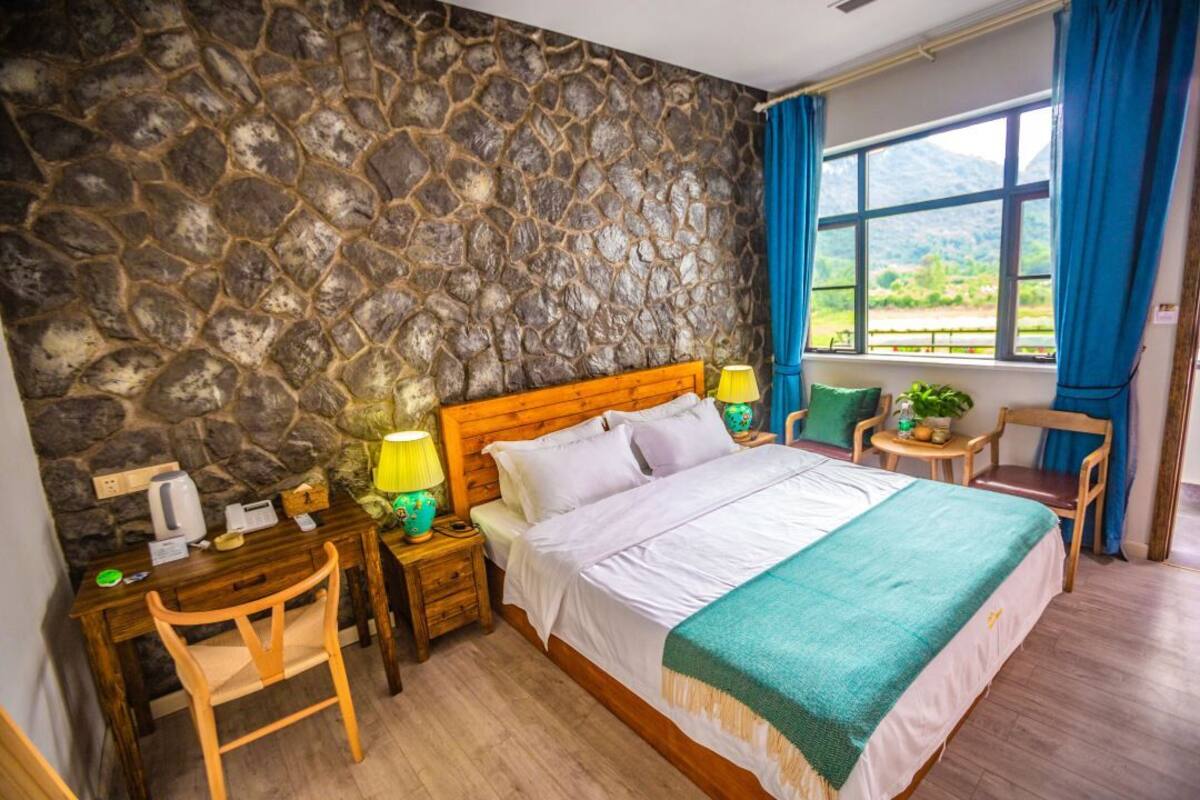 Luksussuite, fjellutsikt | Skrivebord for bærbar PC og wi-fi (inkludert)