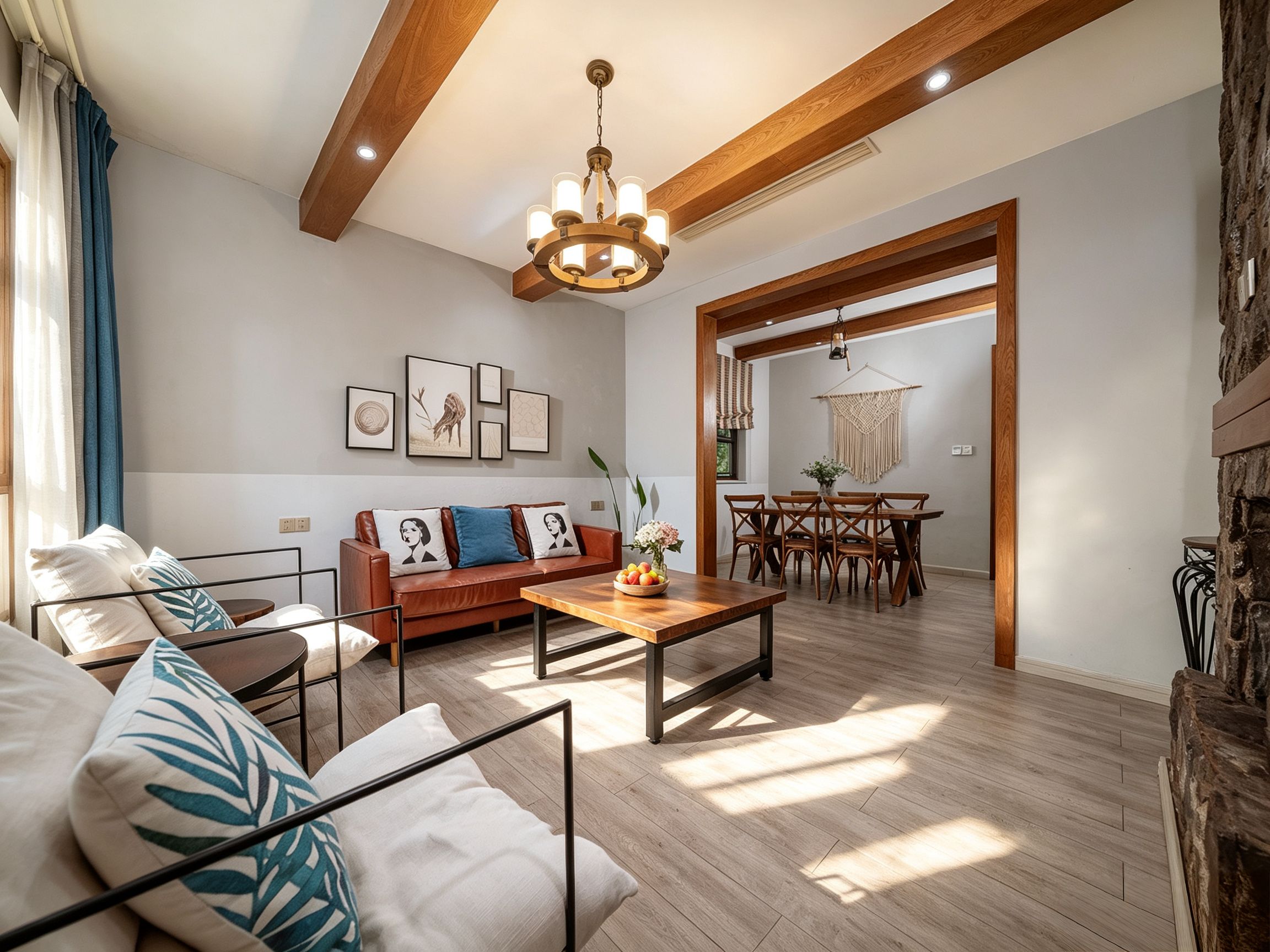 A modern living room with a sofa, coffee table, and artwork on the wall.