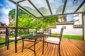 Luksussuite, fjellutsikt | Utendørsservering