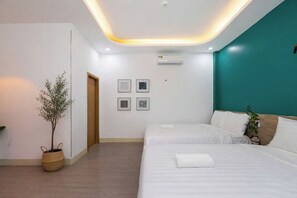 Kamar Quadruple Keluarga | Tempat tidur Select Comfort, Wi-Fi gratis, dan seprai linen