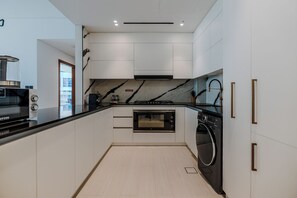 Luxury Apartment, 2 Bedrooms, Balcony, Canal View | Private kitchen | Espresso maker - Trillionaire Residences - Business Bay (Dubai)