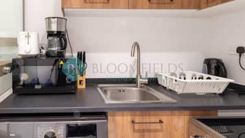 Appartement | Privékeuken | Een waterkoker, een broodrooster