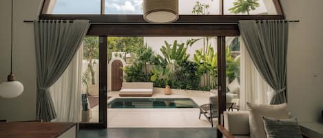 Premium Villa, 2 Bedrooms, Courtyard View | Living area | 50-inch Smart TV with digital channels, Netflix, pay movies