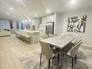 Dining - Stylish 4BR/2.5BA home for up to 10 guests with kitchen, patio, and workspace. (Glen Allen)