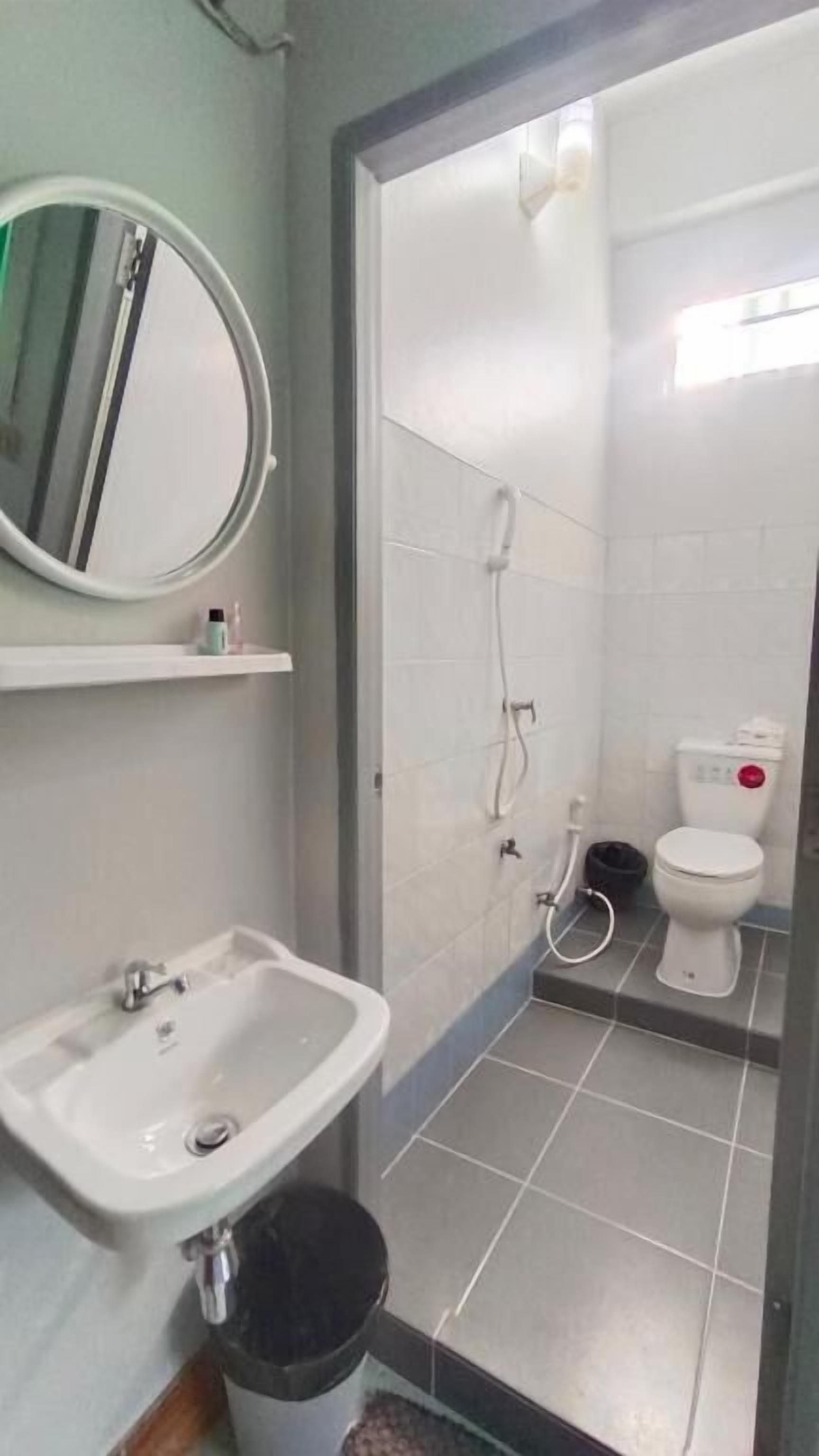Shower dan handuk