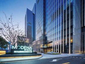 A modern building with a prominent sign for 'MODENA BY FRASER'. - Modena by Fraser Nanjing (Nanjing)