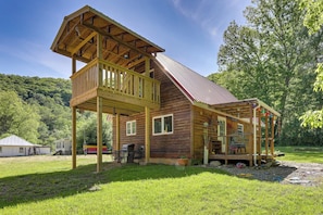 A wooden cabin with a balcony, a covered porch, and a metal roof. - Family Cabin! Close to Greenbrier River & Snowshoe (Cass)