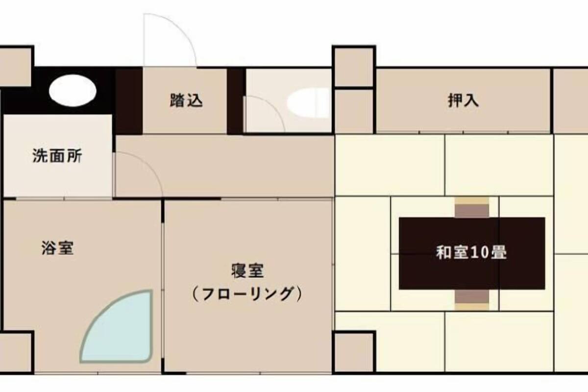 A hotel layout with a bathroom, bedroom, living room, TV, and a small balcony.