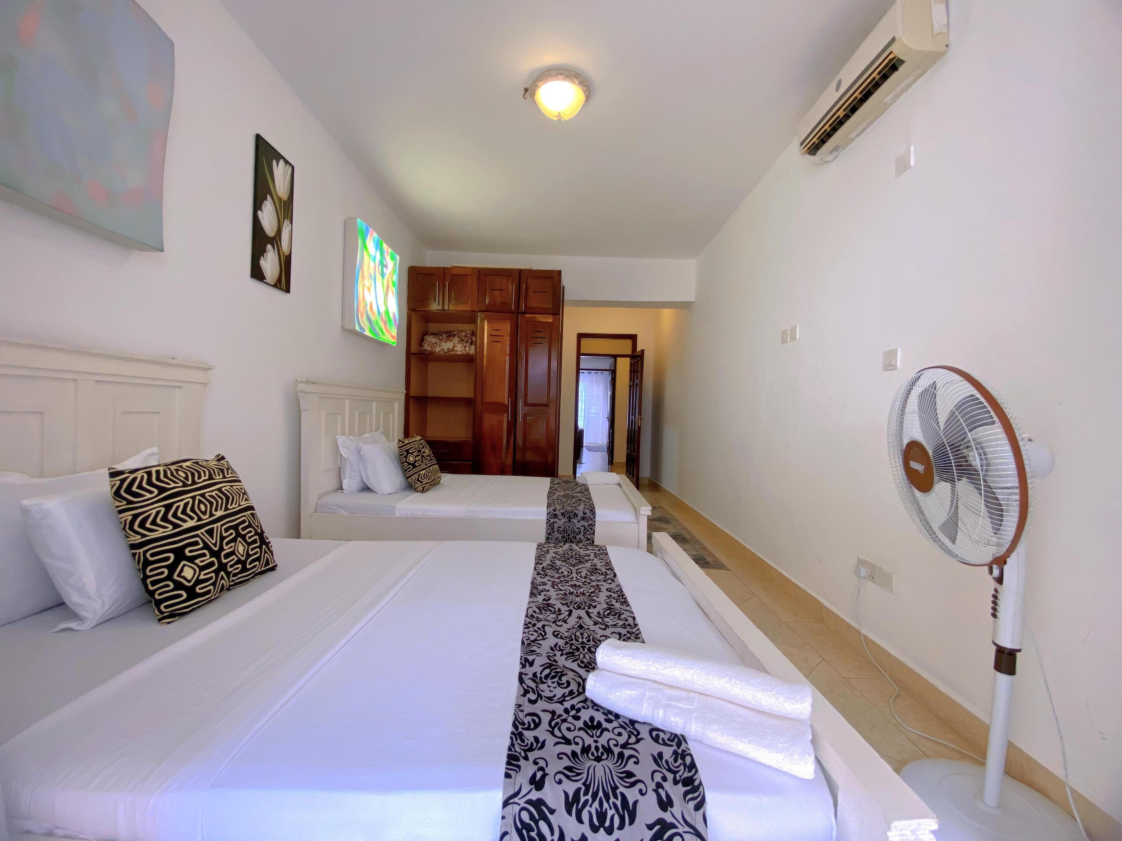 Deluxe Apartment, Sea View | Desk, laptop workspace, iron/ironing board, free WiFi