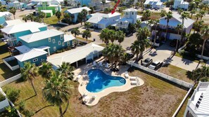 Exterior - Pool + Boardwalk Access, Pond View • Walk to Beach | Mustang Royale by AvantStay (Port Aransas)