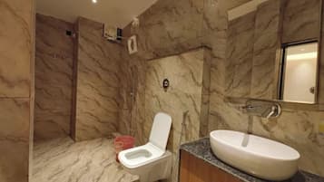 Shower, free toiletries, towels, soap