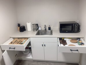 Fridge, microwave, coffee/tea maker, toaster - The Cozy Oasis Place (Winnipeg)
