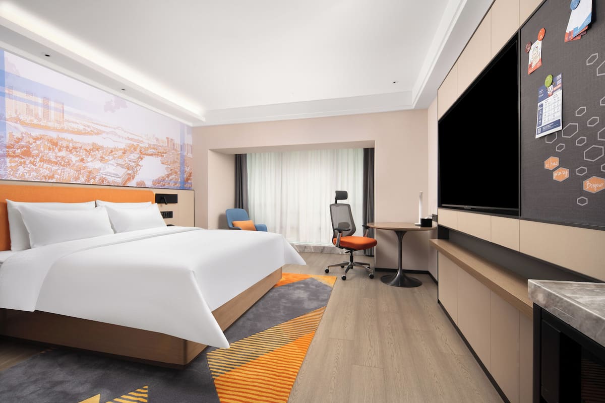 Superior Double Room, Partial Lake View | Laptop workspace, free WiFi