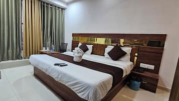 Deluxe Double Room, City View | Desk, laptop workspace, iron/ironing board, free WiFi