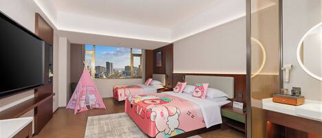 A hotel room with a large bed, a TV, a city view, and a bathroom with a mirror and sink.