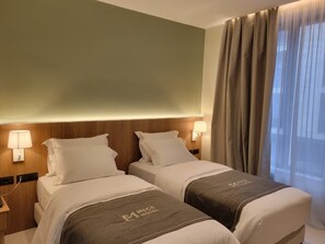 Double or Twin Room | Minibar, in-room safe, desk, blackout drapes - Mece Hotel (Tirana)