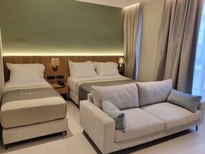 Standard Triple Room | Minibar, in-room safe, desk, blackout drapes - Mece Hotel (Tirana)