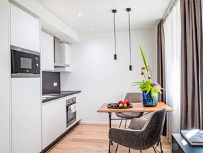 Fridge, microwave, cookware/dishes/utensils - Munich Finest Apartment Studio 2 by Interhome (Munich)