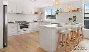 Fridge, microwave, oven, stovetop - Elegant Beachside Retreat with Luxurious Amenities (Tomakin)