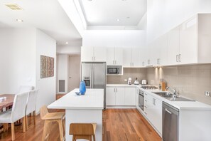 Fridge, oven, stovetop, dishwasher - 2-Bed Apartment with Parking & Balcony Near Trains (Yarraville)