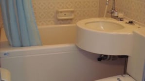 A bathroom with a toilet, sink, and bathtub. - Single Inn Niigata No.2 (Niigata)