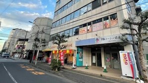 A multi-story building with commercial establishments on the ground floor, including a restaurant and a convenience store. - Maria Hotel (Utsunomiya)